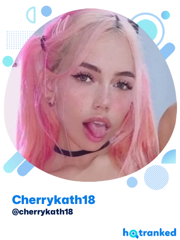 close-up of Cherrykath18 with pink hair and playful expression