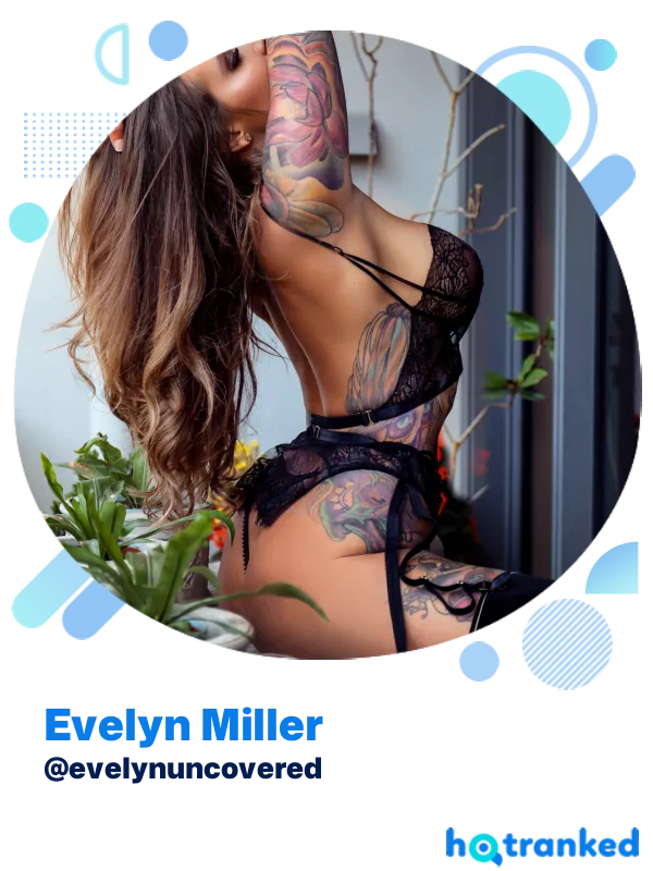 alluring Evelyn Miller in black lace lingerie by window