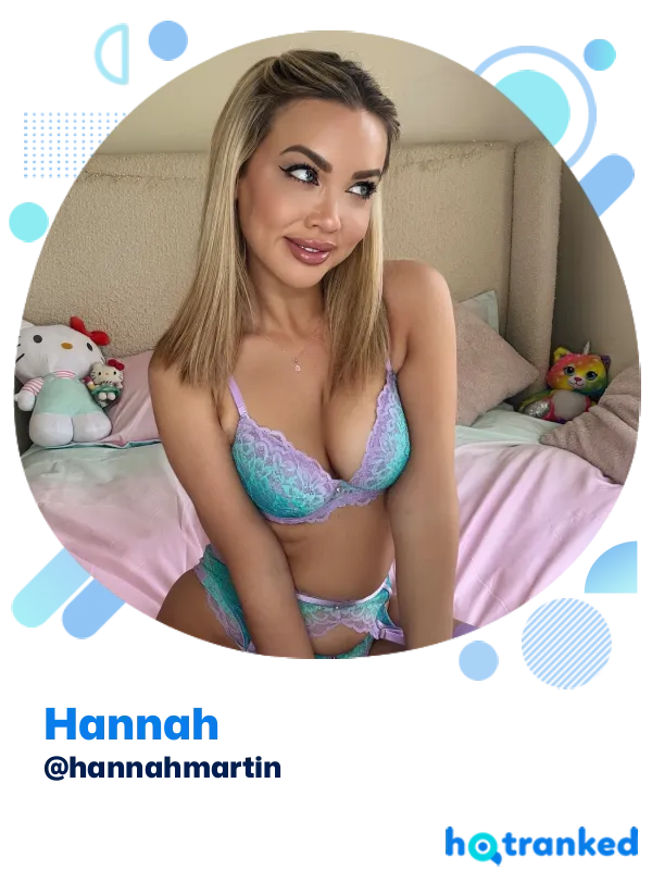 smiling Hannah in pastel lace lingerie on pink bed