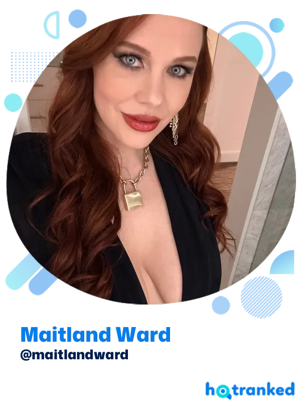 smiling woman Maitland Ward with red hair in black dress