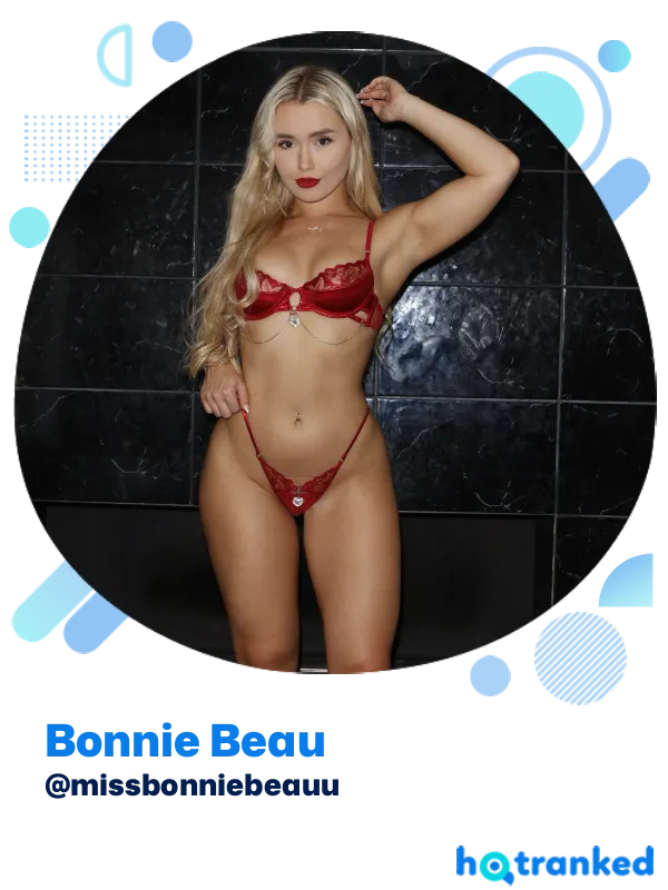 confident Bonnie Beau posing in red lingerie set